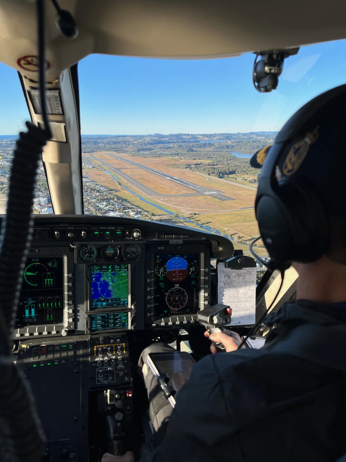 Pilot at the controls of a Bell 429
